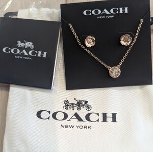 Coach rose gold earrings and necklace set